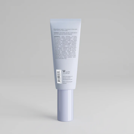 Skincare tube with label on a gray background