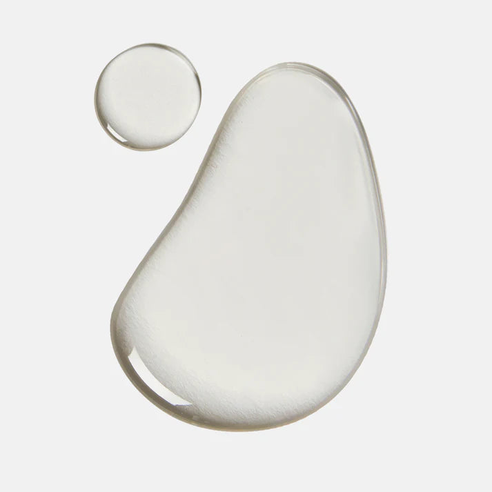 Two product droplets on a light gray background